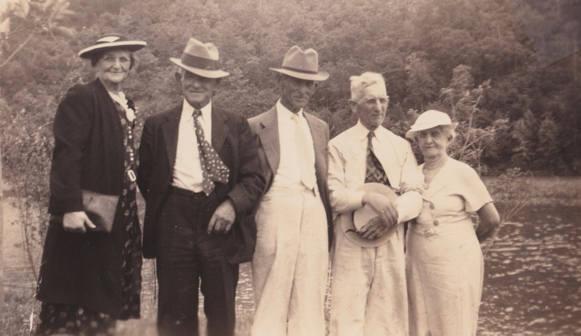 Five family members by the river, 1930s